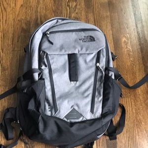 grey new north face surge backpack